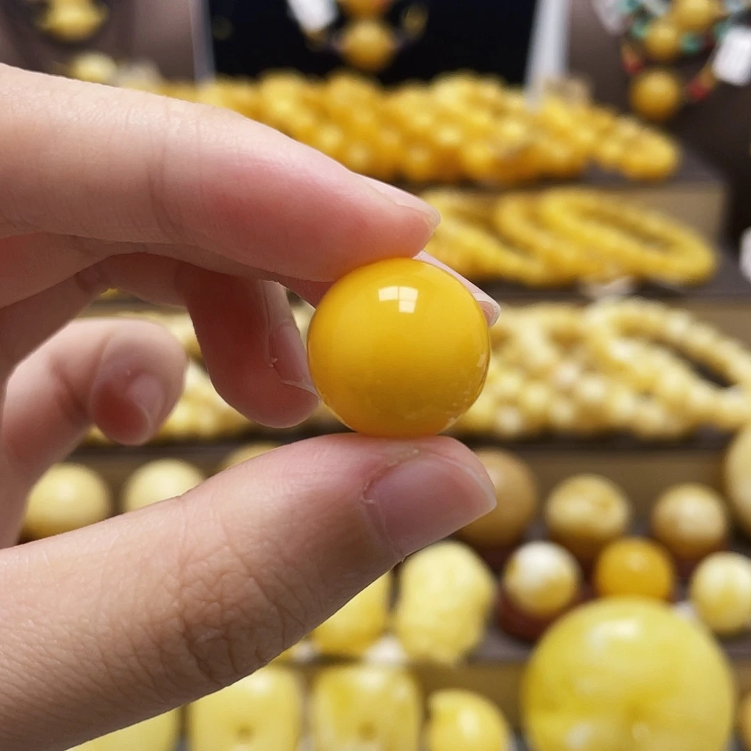赵***泽裸石琥珀未镶嵌16mm鸡油黄圆珠