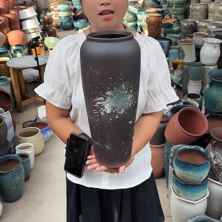 口14高41瑕疵一个盆子。