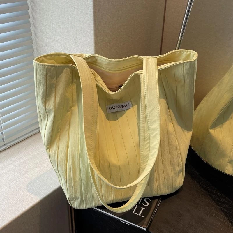 夏季大容量单肩包包女休闲褶皱帆布手提袋百搭学生上课通勤托特包