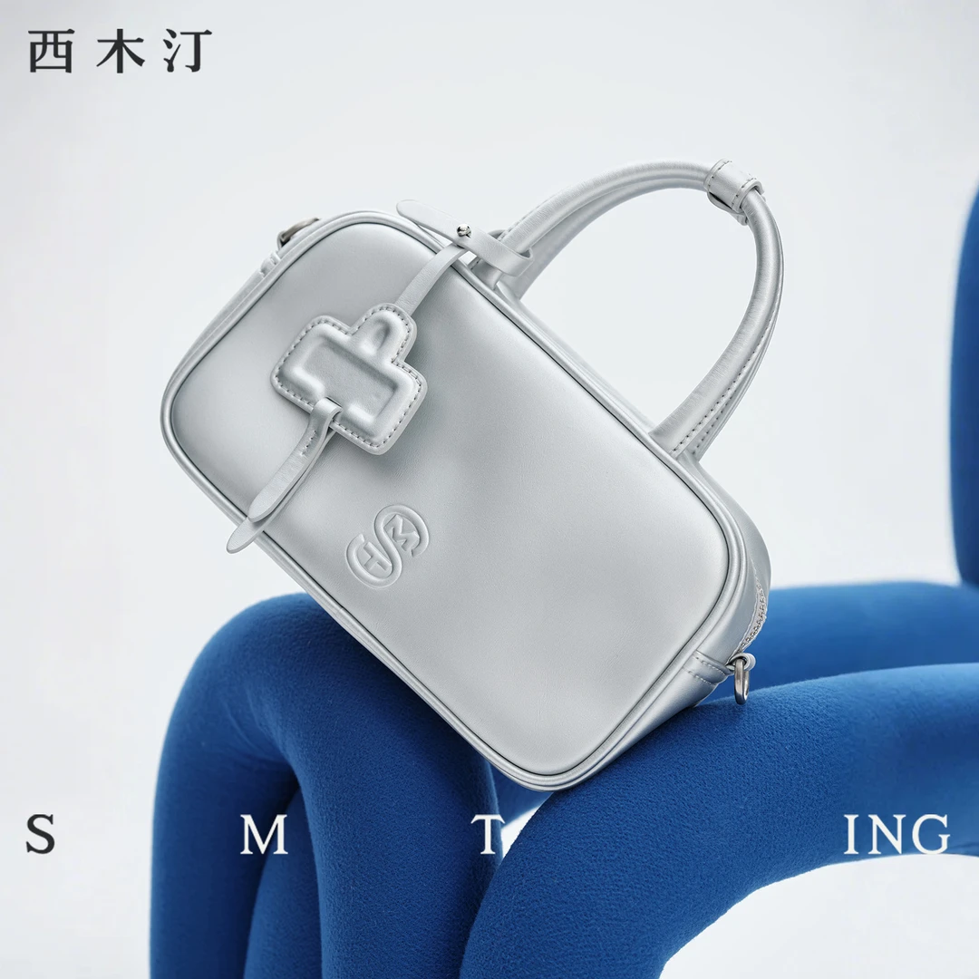 【西木汀】绵绵 牛皮镭射手提包上班族女简约单肩春夏搭配小包包