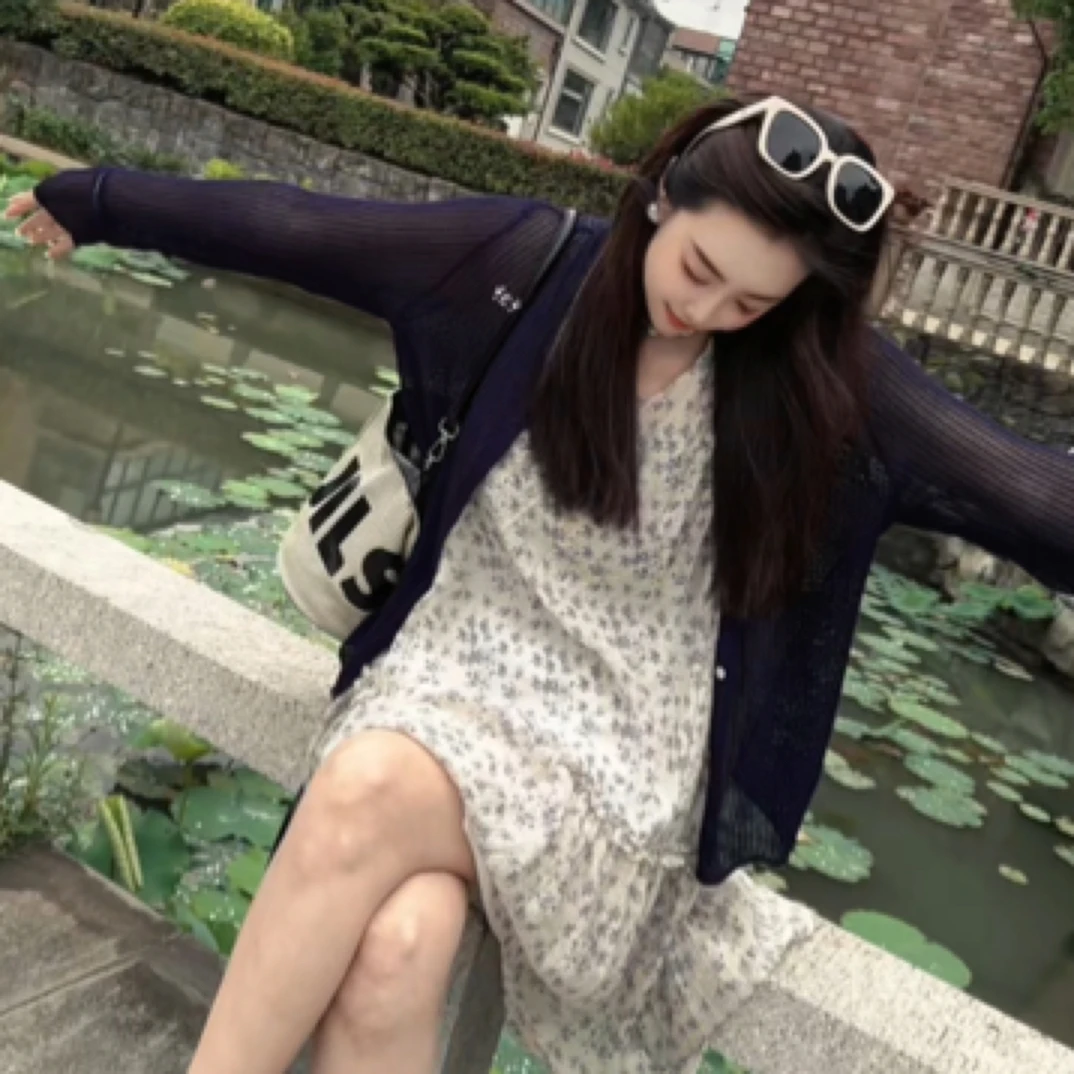 夏季法式优雅碎花V领无袖中长款连衣裙女气质宽松