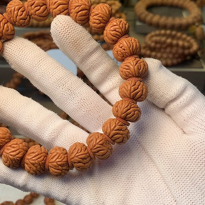 秋***鱼桃核手串秦岭龙纹