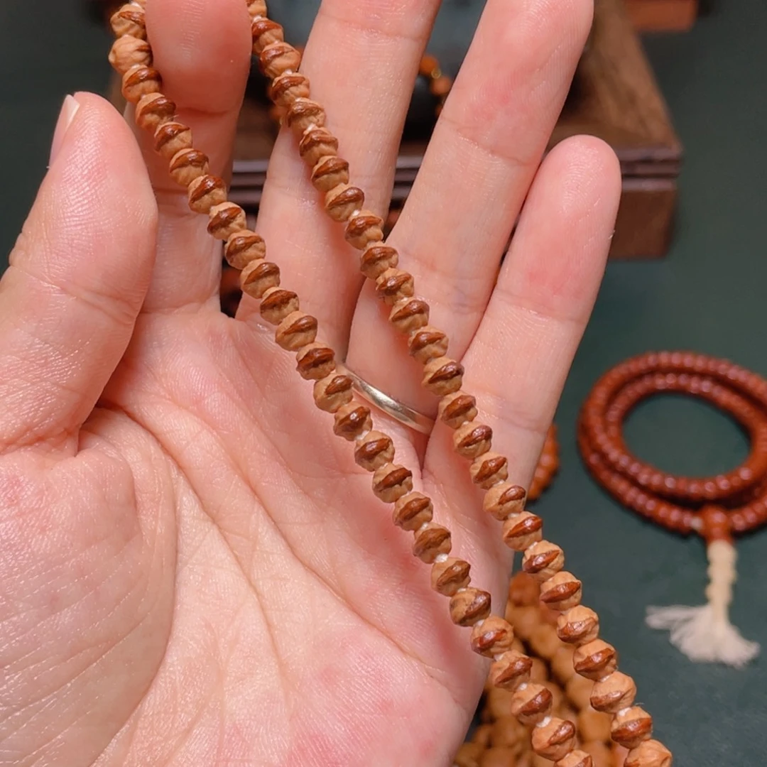 柏香籽/百香籽吊坠小凤眼手持