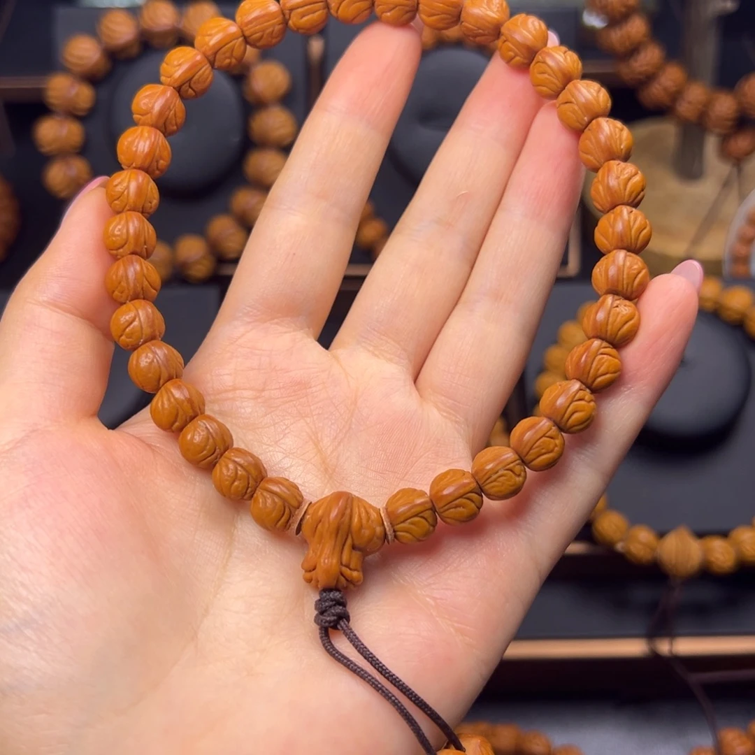 一***腿手串桃核野生玉龙脊0.9