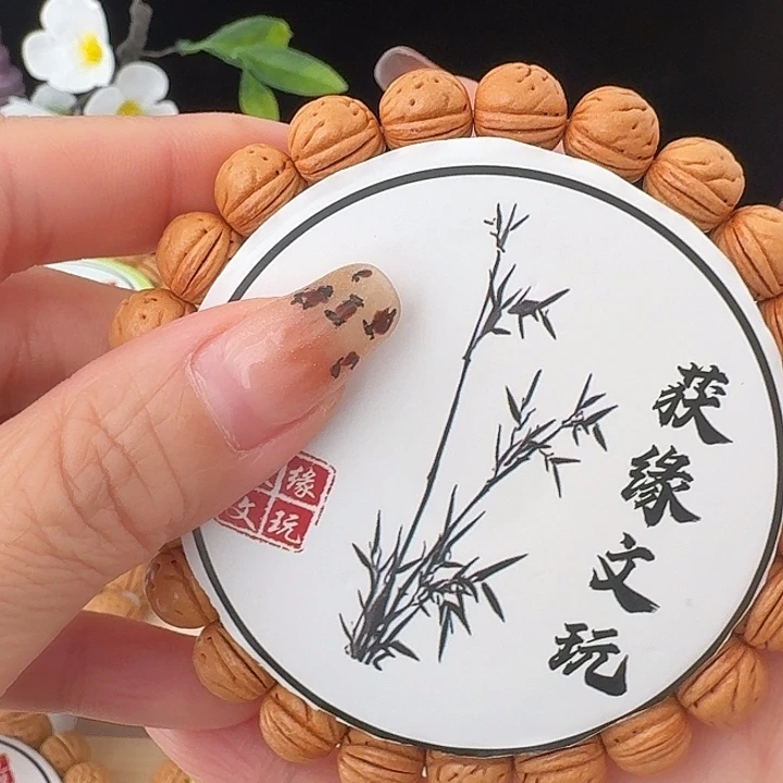 宋***强手串桃核精品桃核一道筋黄桃