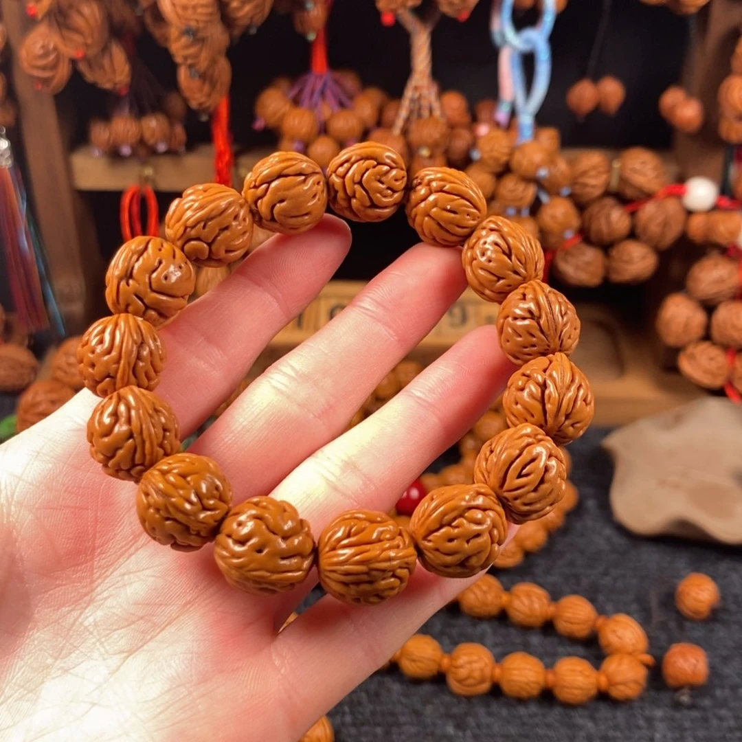 吊坠桃核桃枭手串