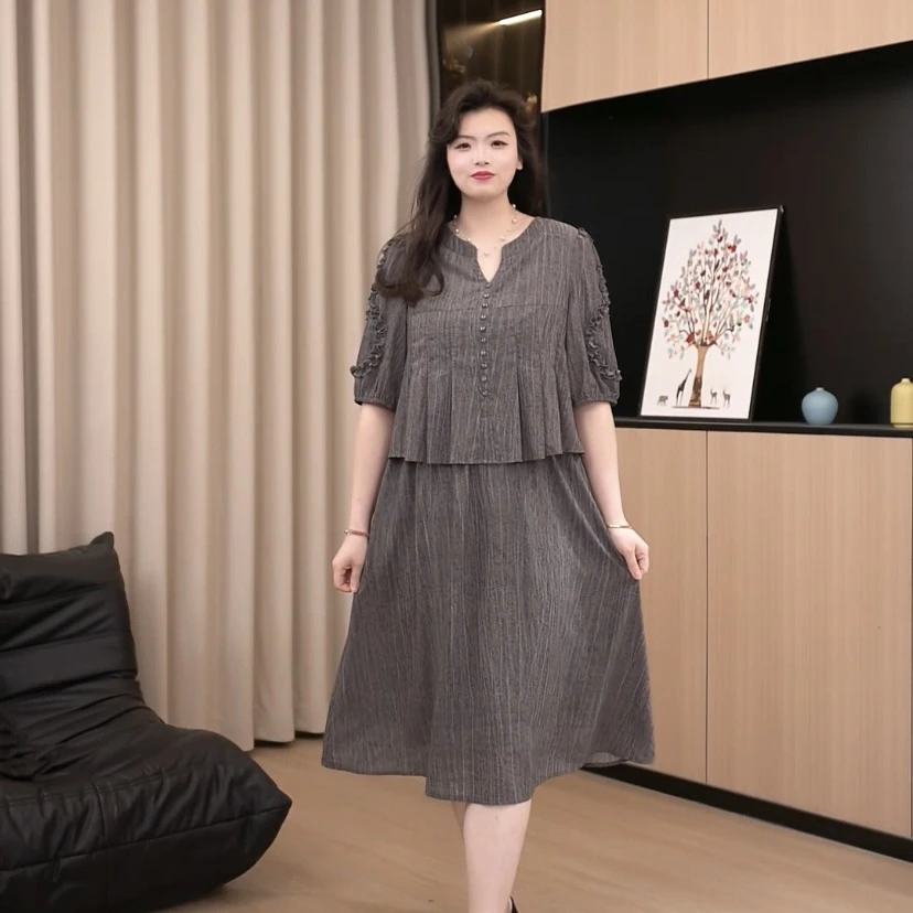 胖依依大码女装2025新款气质显瘦时尚宽松妈妈装中长连衣裙ZB6780