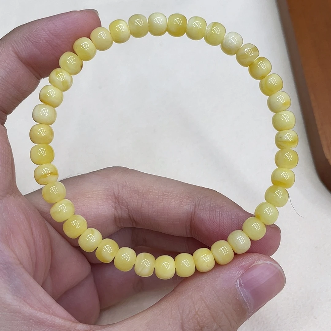 琥珀未镶嵌手串浓蜡妖花款老型手串