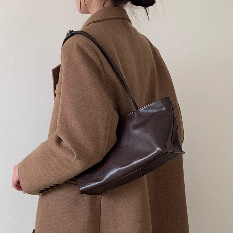 植鞣头层牛皮小船包2025新款极简风真皮复古通勤单肩托特包腋下包