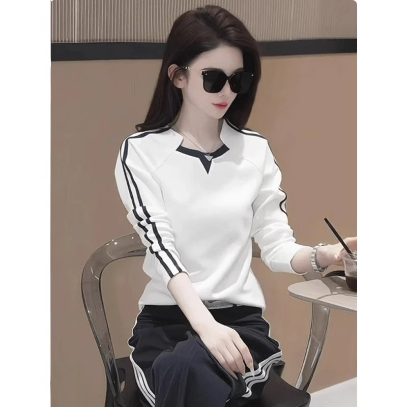 芯娇晴撞色拼接条纹长袖t恤女装2025新款春季不规则裁剪显瘦上衣