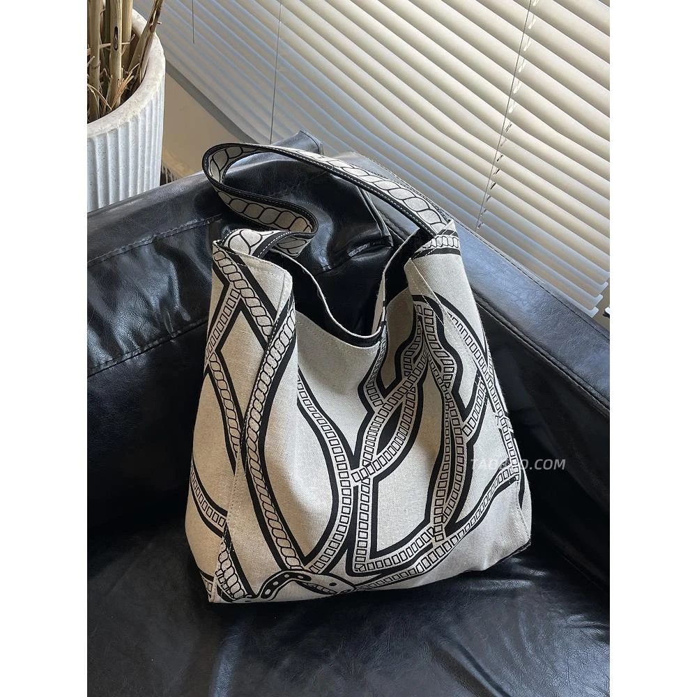 通勤大容量帆布包包女式2025新款百搭单肩包外出上班托特包水桶包