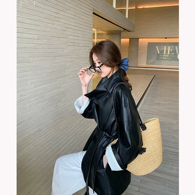 韩女氛围设计高级感炸街复古黑PU皮西装皮衣外套女春秋港风大衣