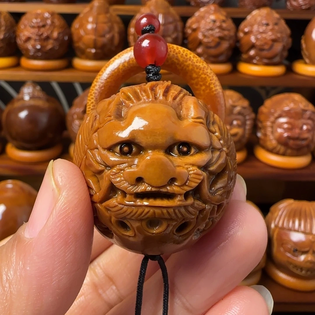把件橄榄核龙手把件