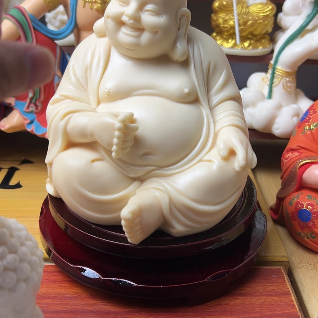 从***过藤弥勒佛➕赠品底座上的