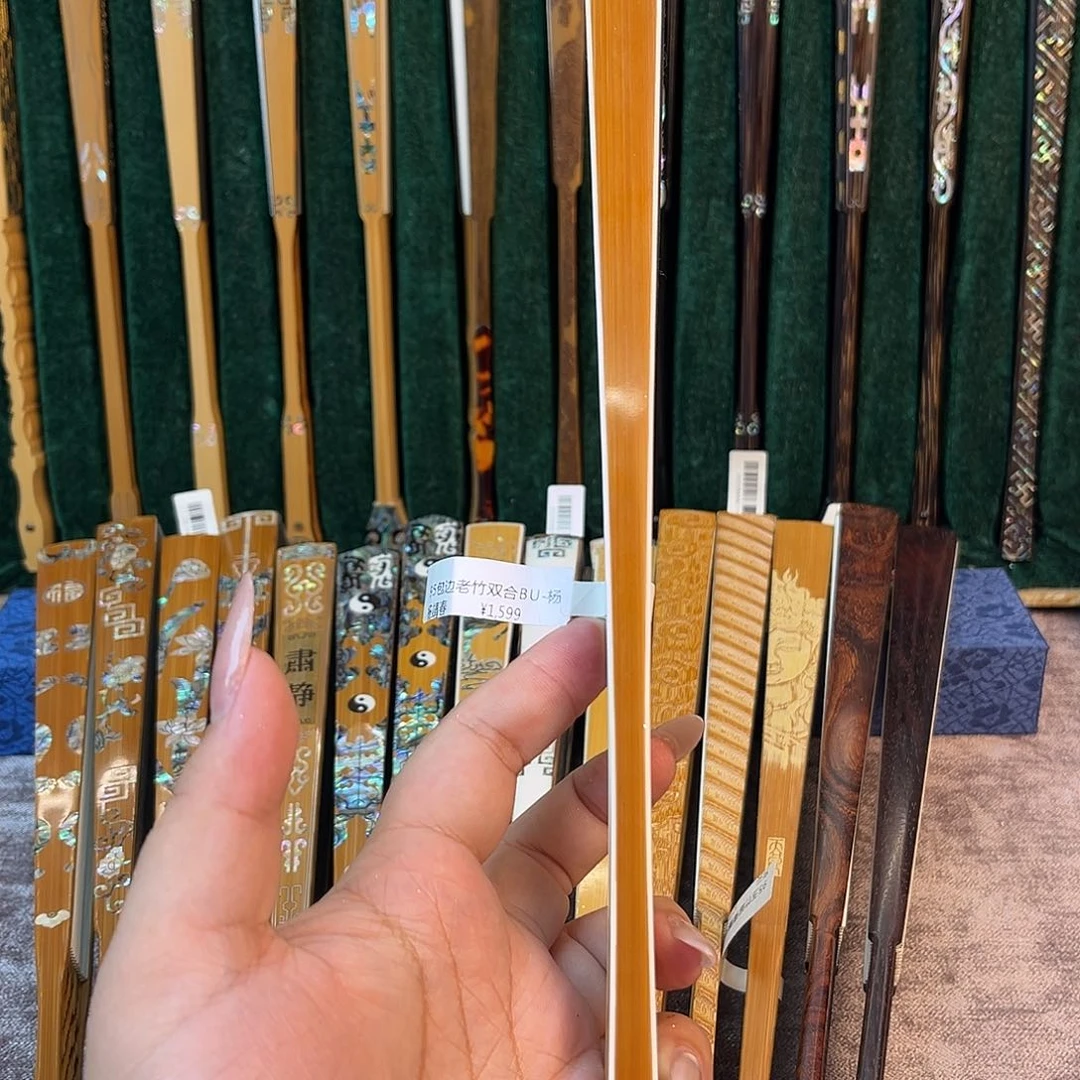 爱***拉扇子手工制作工艺精湛