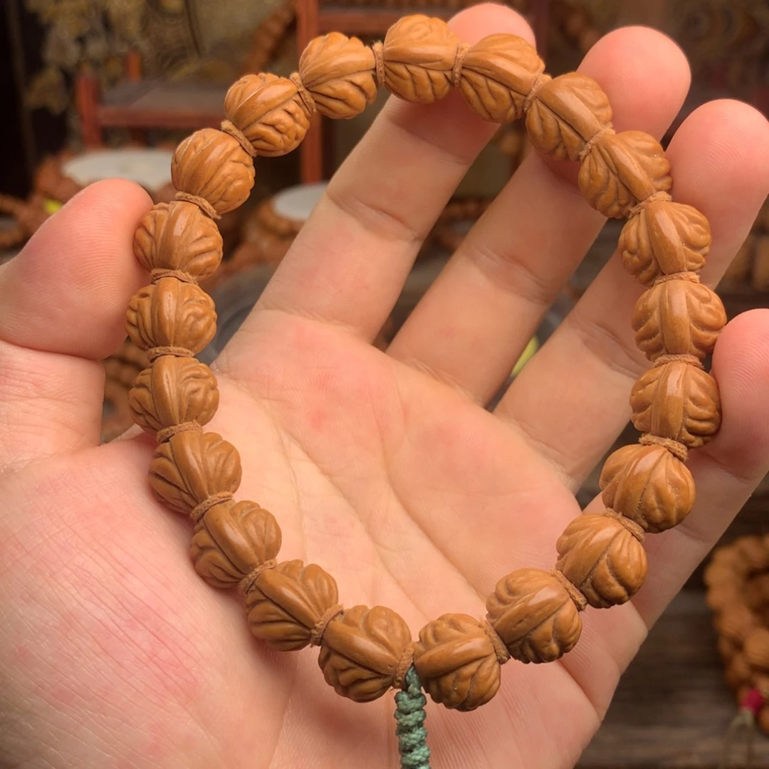 桃核吊坠14金豆 龙纹桃核