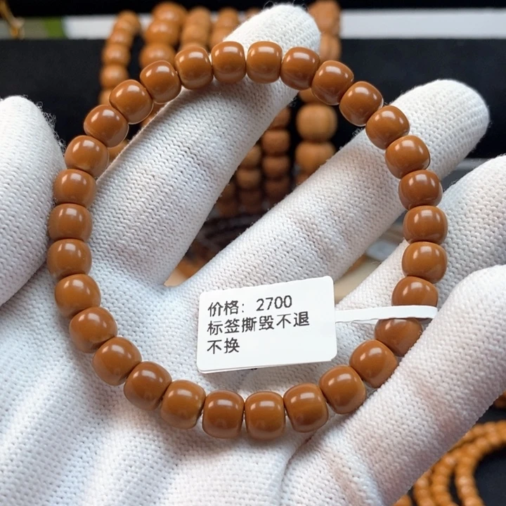 司***州橄榄核手串7.5老挝核尖单圈保真