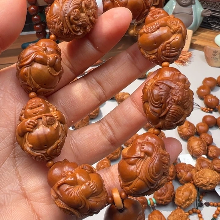 漫***光橄榄核手串/手链瑞兽弥勒