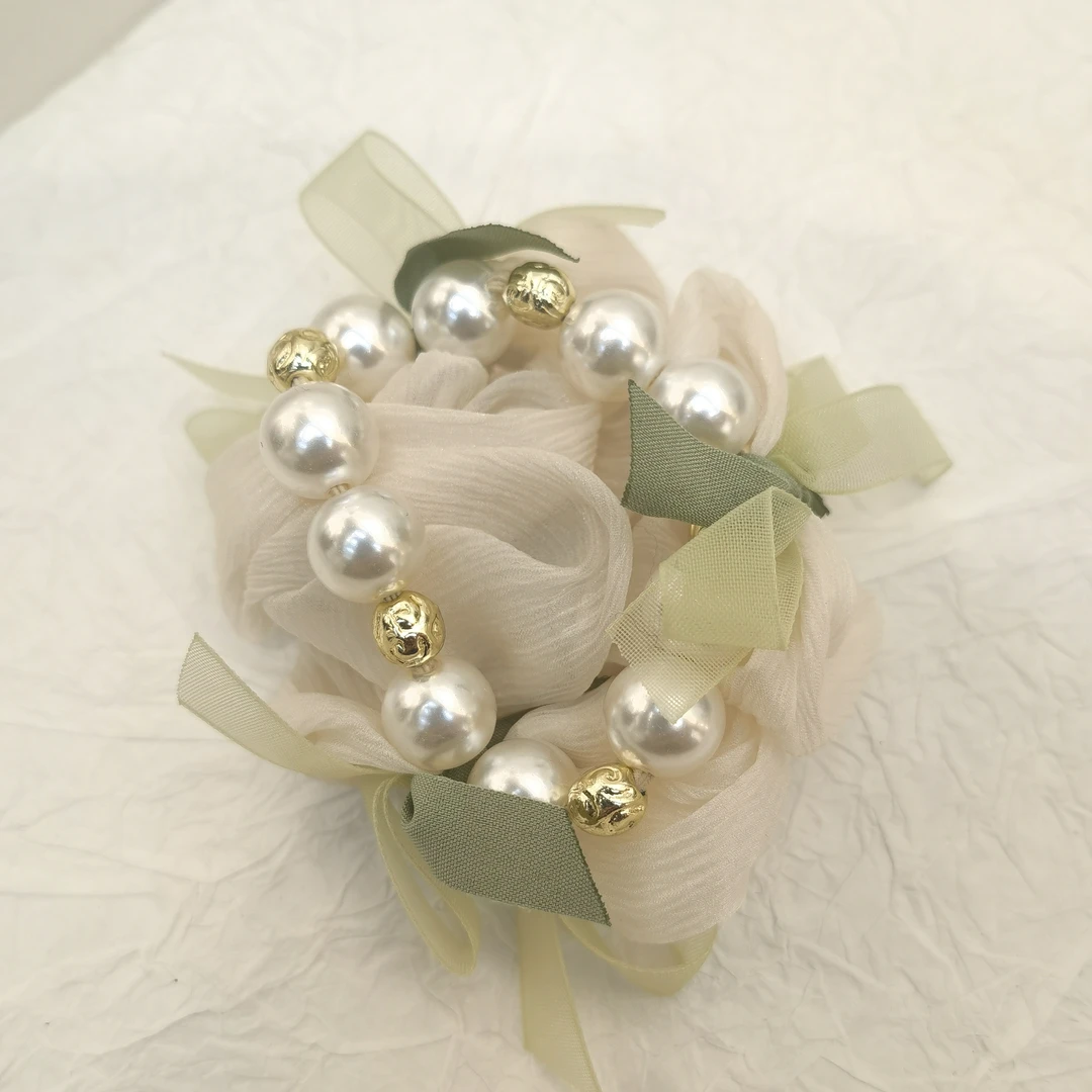 E295绿色三个蝴蝶结纱纱串珠发绳