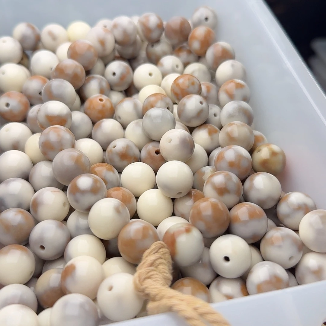 丁****菩提根/象牙果吊坠50 颗奶油巧克力 14 干磨圆