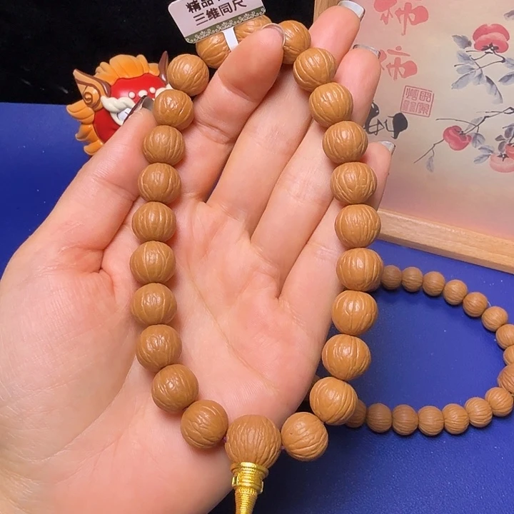 K***i猴头核桃手串聚宝盆