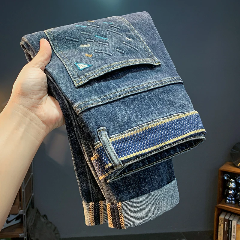 牛仔裤男士秋季新款潮流刺绣印花修身小脚长裤休闲百搭宽松男裤子