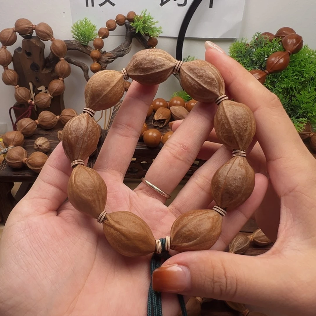 H***l橄榄核手串20.29梅林铁核
