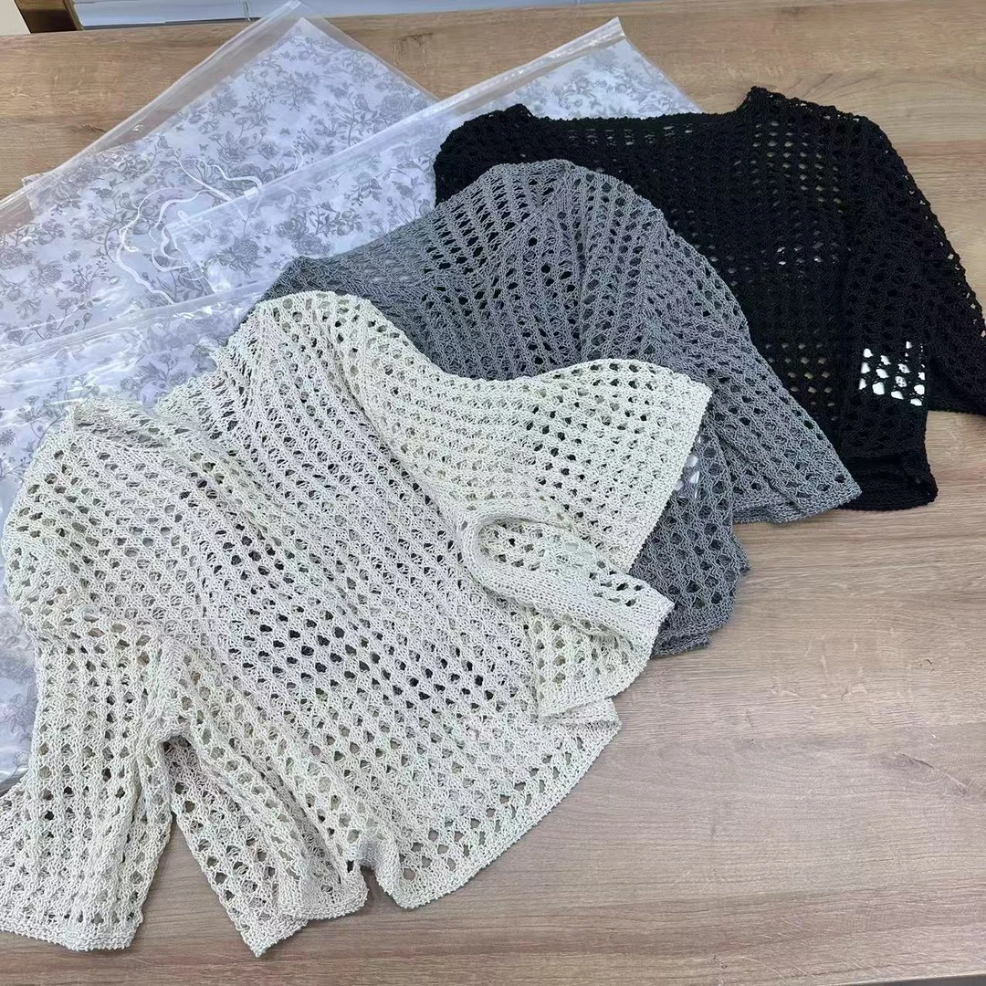 W 663 北欧青 镂空针织小上衣（衣长43 胸宽51）