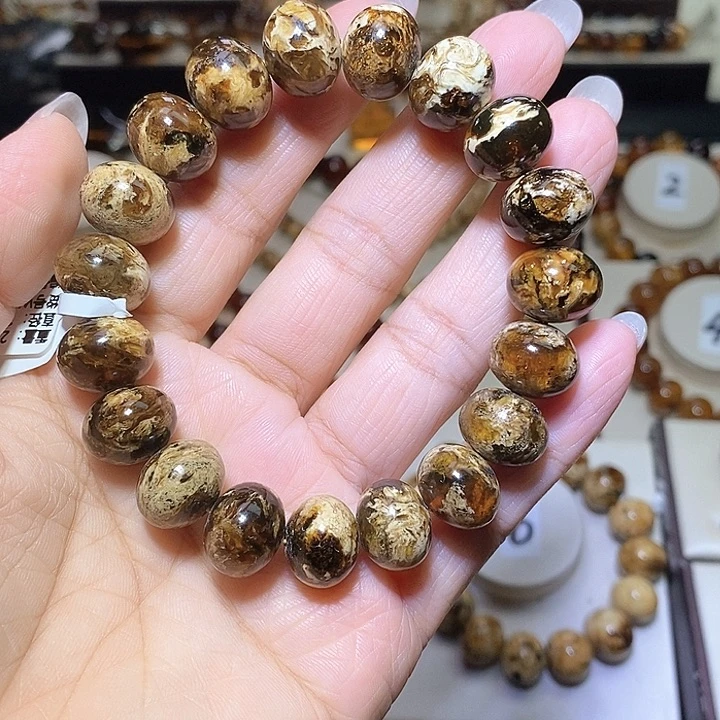 浩***哥琥珀未镶嵌裸石熊猫花13m