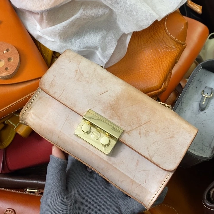 头层牛皮瑕疵单肩包