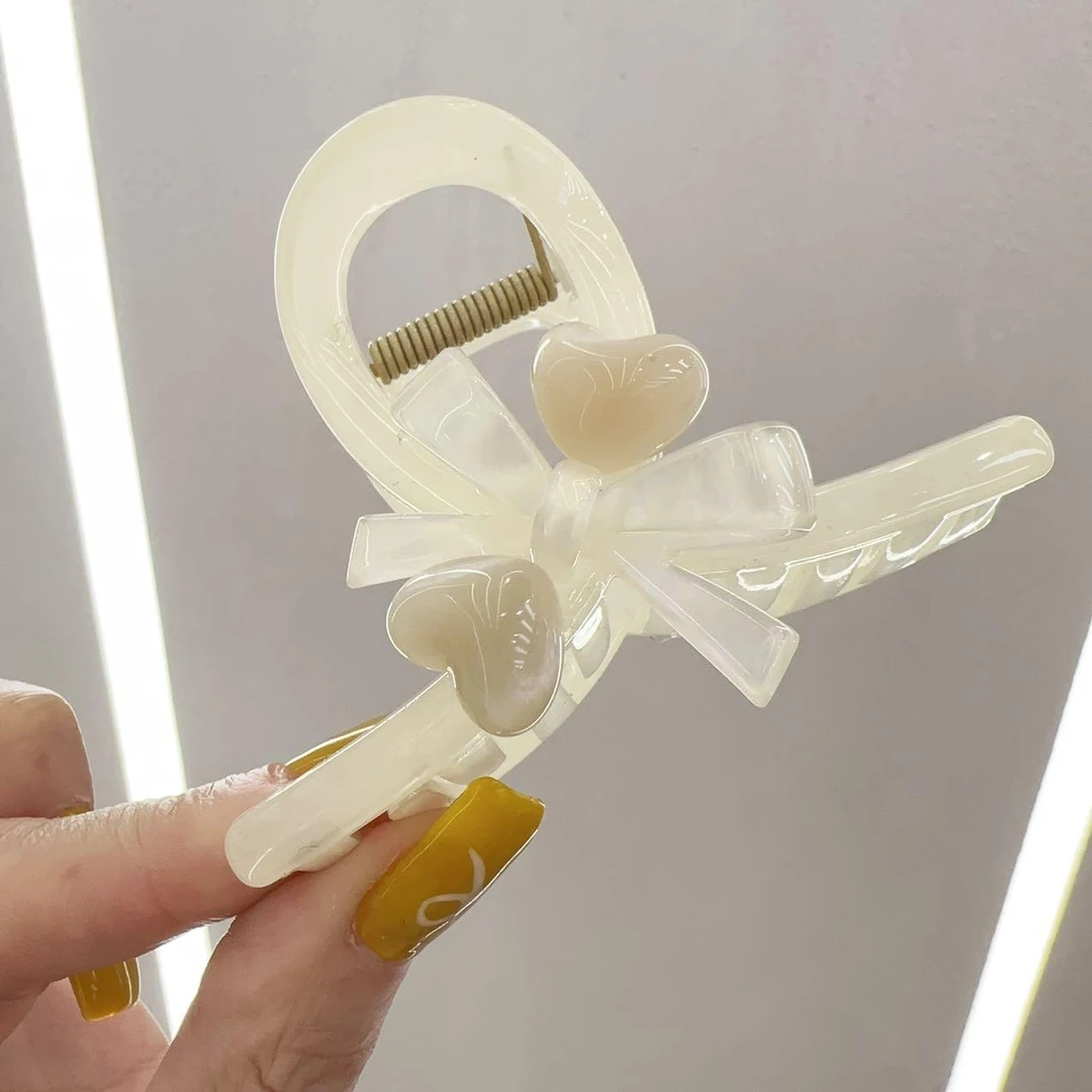 A359高级荔枝白色蝴蝶结长不大抓夹