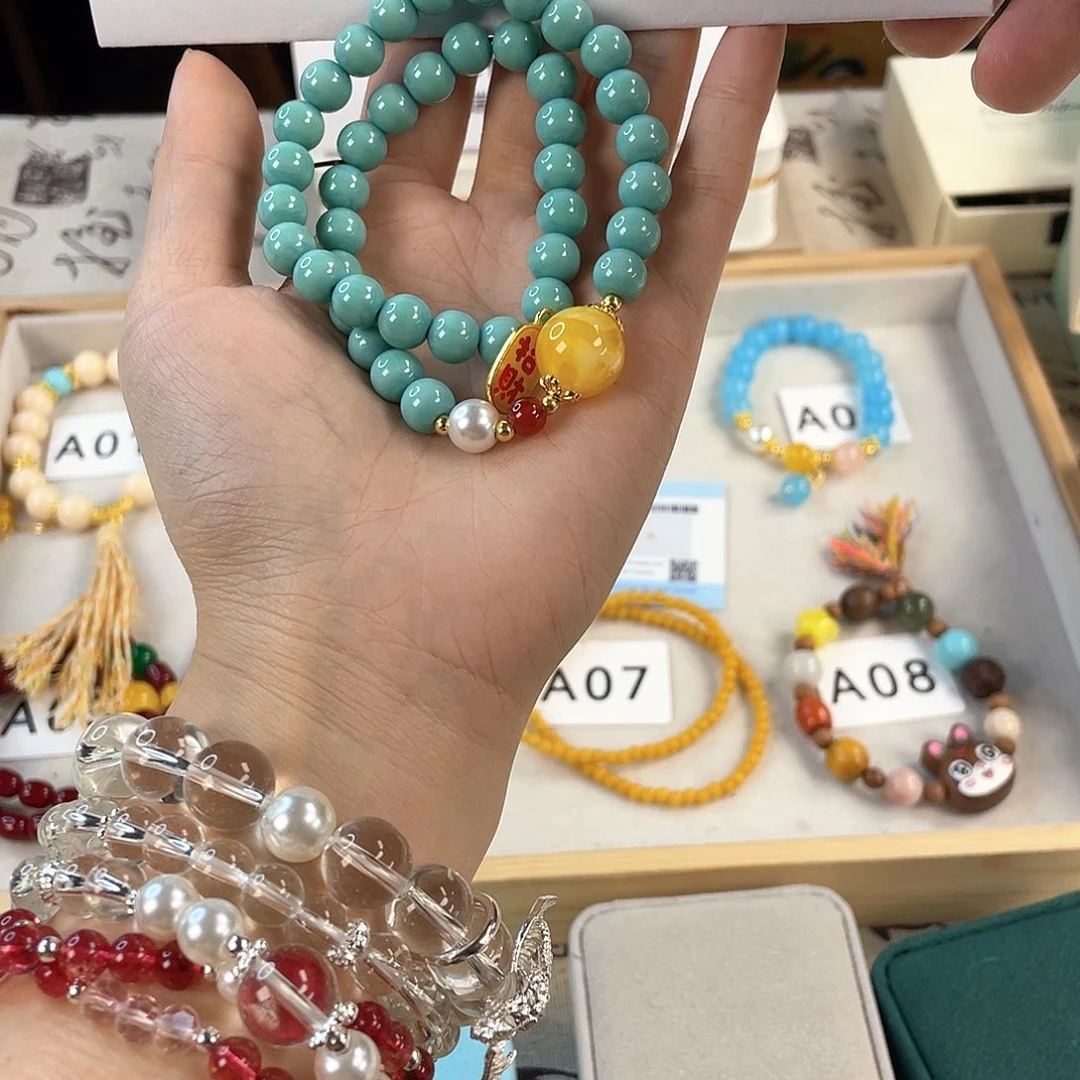 针钠钙石手饰银S925镀金镶嵌醋****?