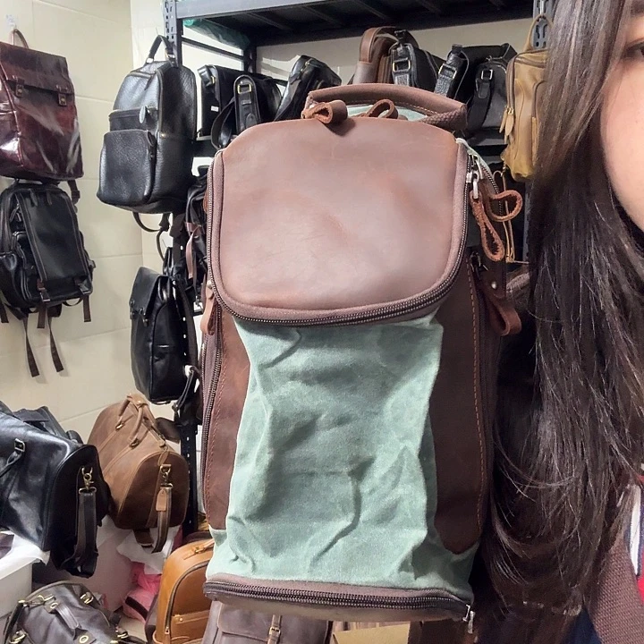 帆布疯马皮斜挎胸包