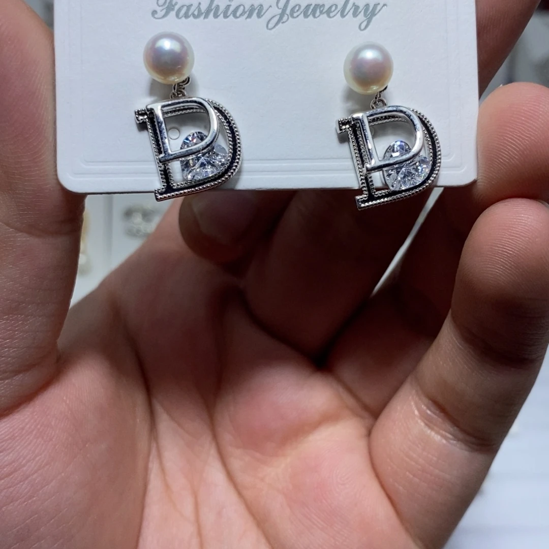 淡水珍珠银S925镶嵌耳饰