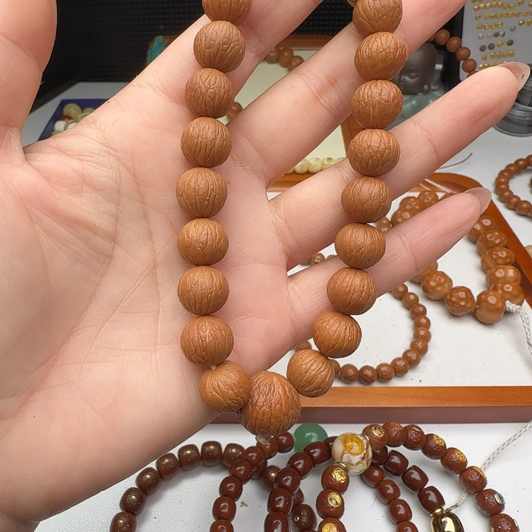 性***善猴头核桃手串凤羽