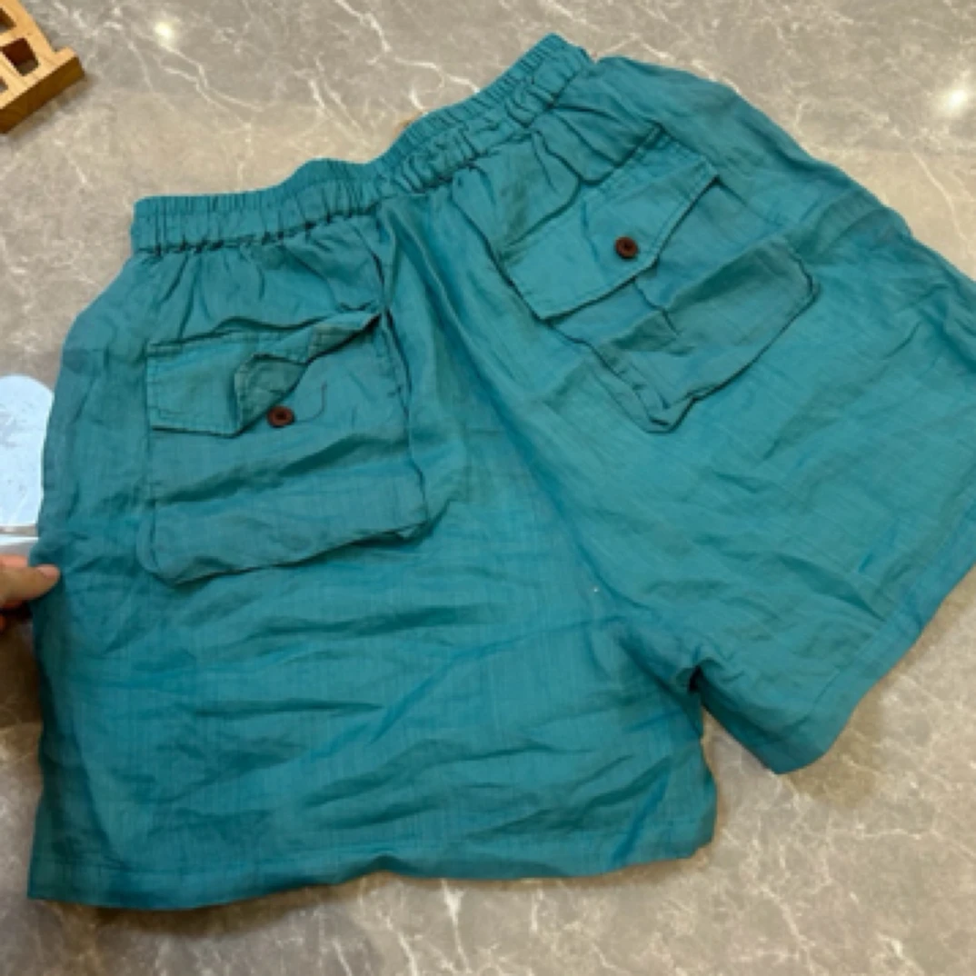 妞妞 新款苎麻双层系绳立兜双口袋百搭宽松短裤