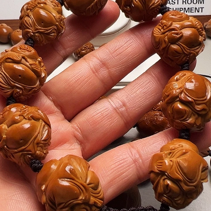 龙***伟橄榄核手串/手链弥勒佛