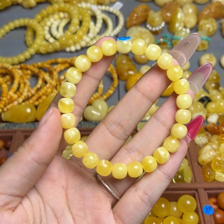 蜜蜡未镶嵌珠宝奇石鸡油黄满蜡妖花手串 微微瑕