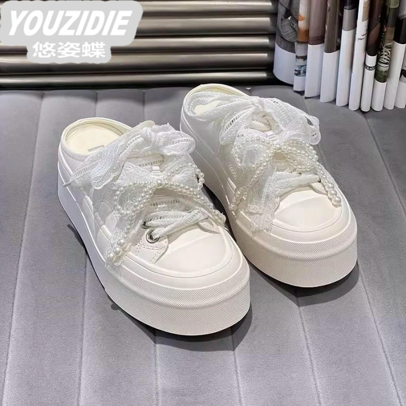 欧洲站2025新款夏外穿真皮厚底蝴蝶结珍珠一脚蹬包头小白半拖鞋女