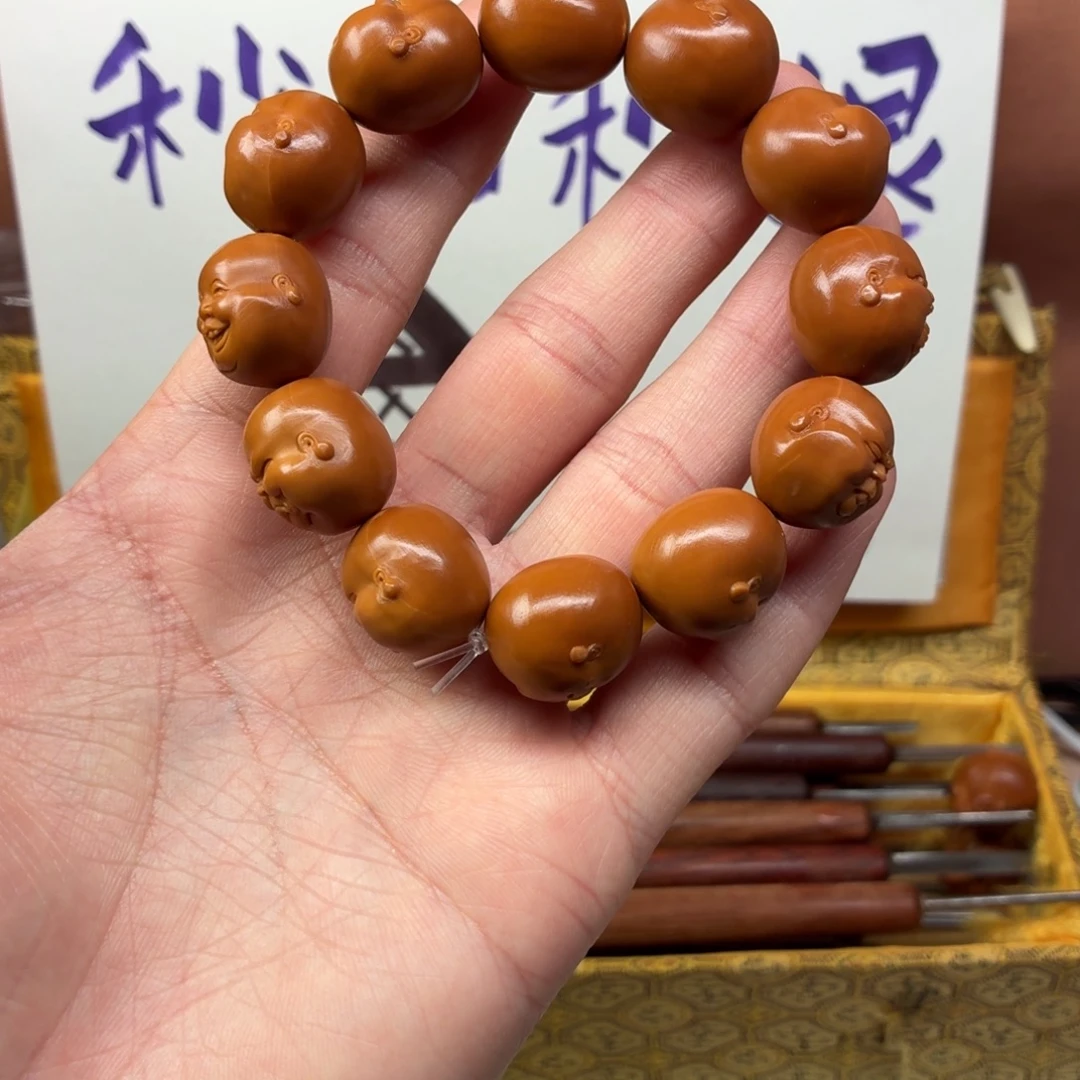 橄榄核吊坠人生百态