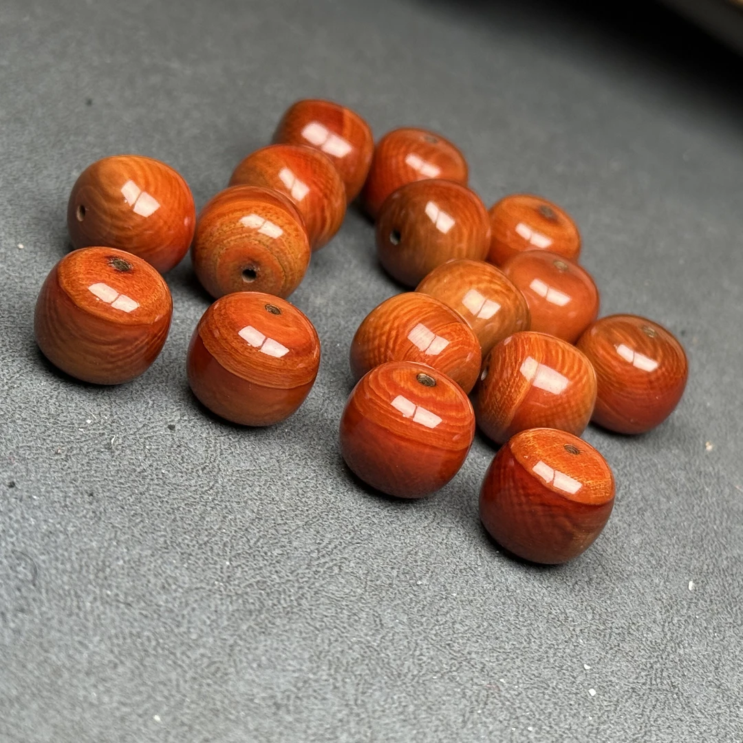A042猛犸牙猪肝红单珠配饰14X13mm单颗