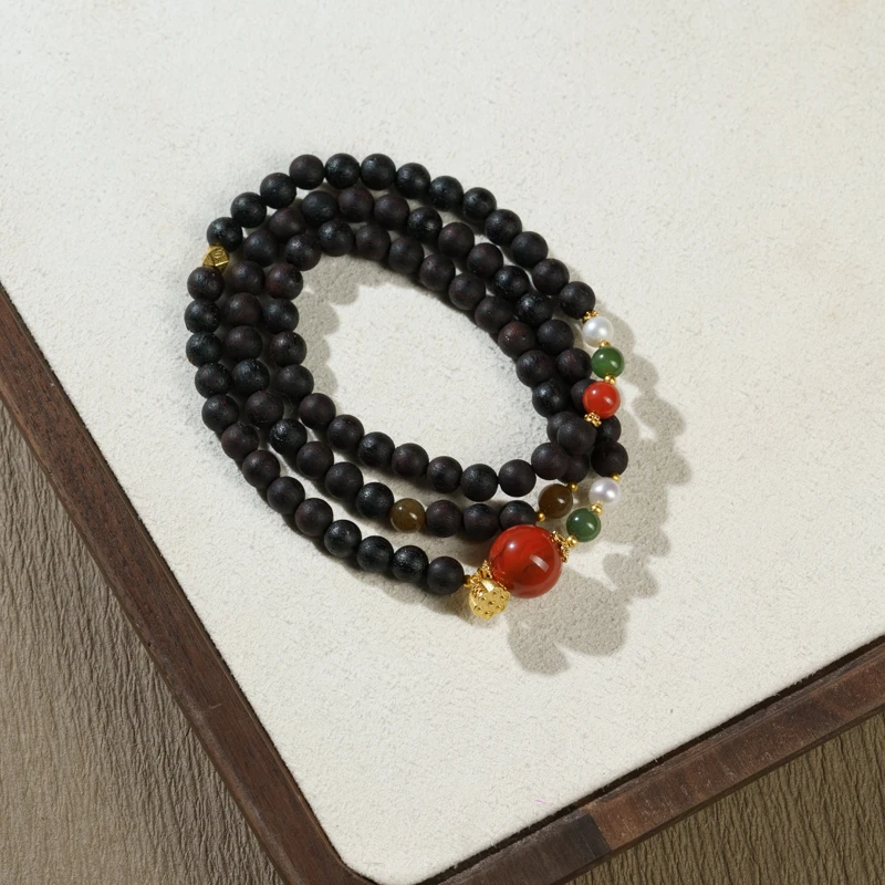 【朱颜】0.6降真香南红多圈手串