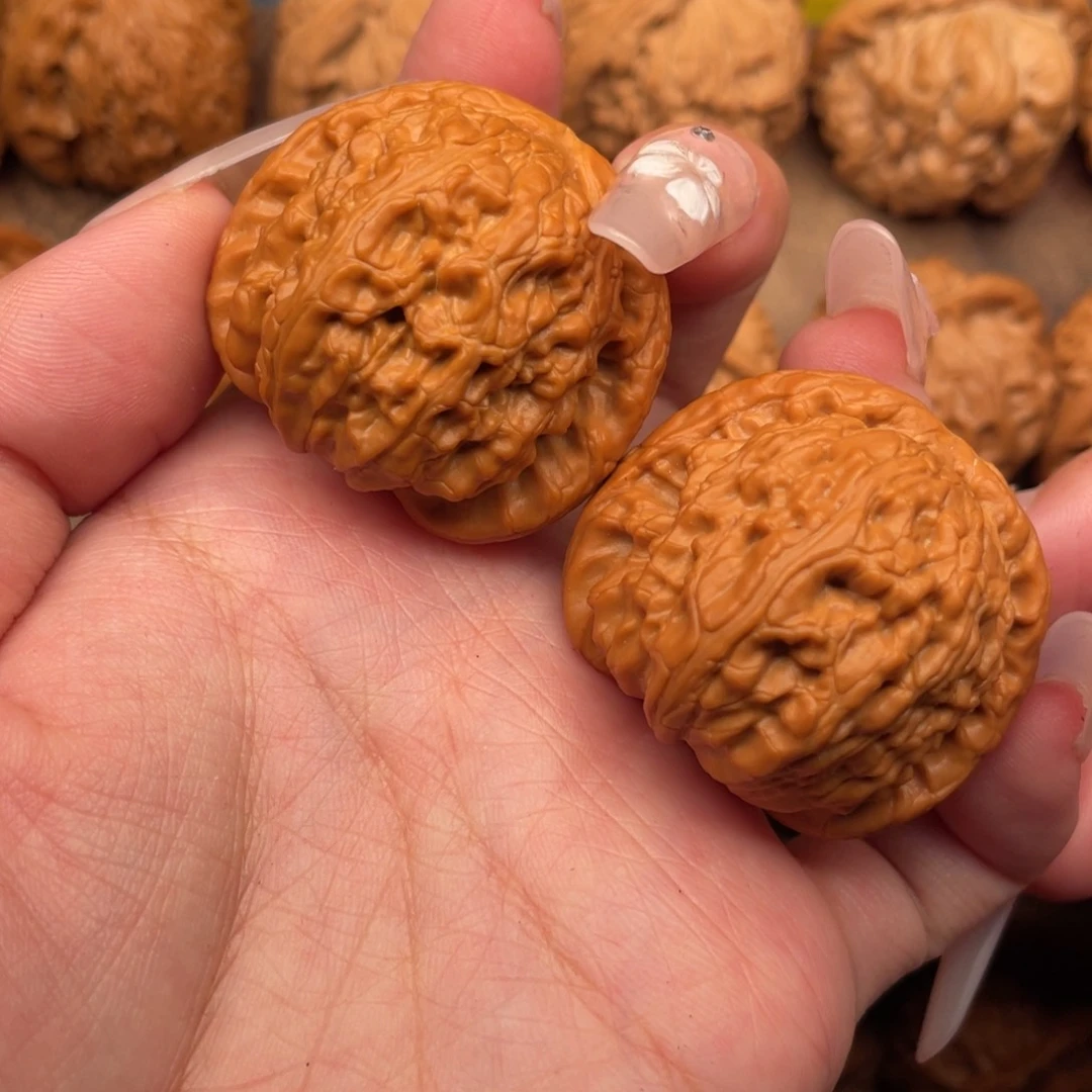 文玩核桃把件全品，精配红皮球白38