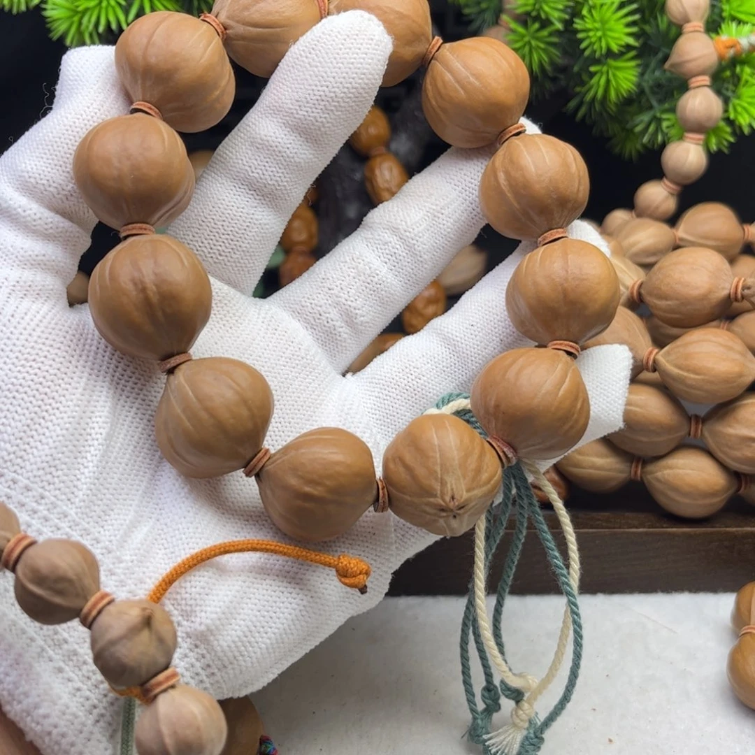 手串/手链橄榄核头**能2.3*2.4四花铁核