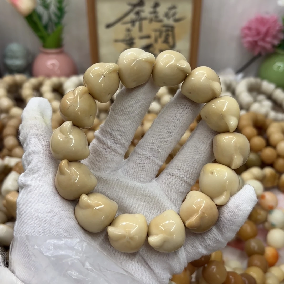 吊坠菩提根/象牙果牙果瑕疵机抛705