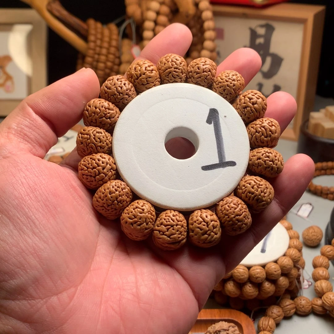 奋***子桃核手串1.8豁牙子桃核手串