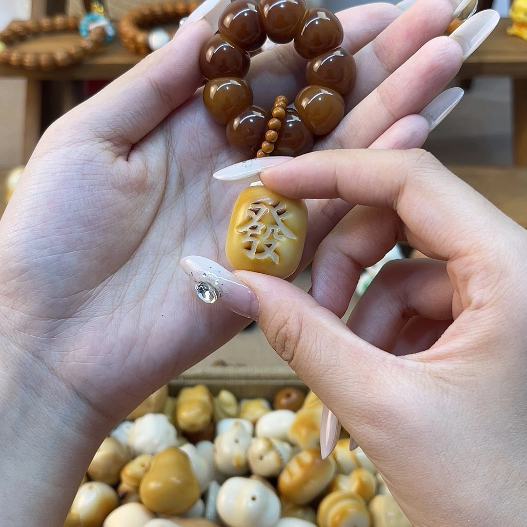 谷***粒吊坠菩提根/象牙果手捻一个