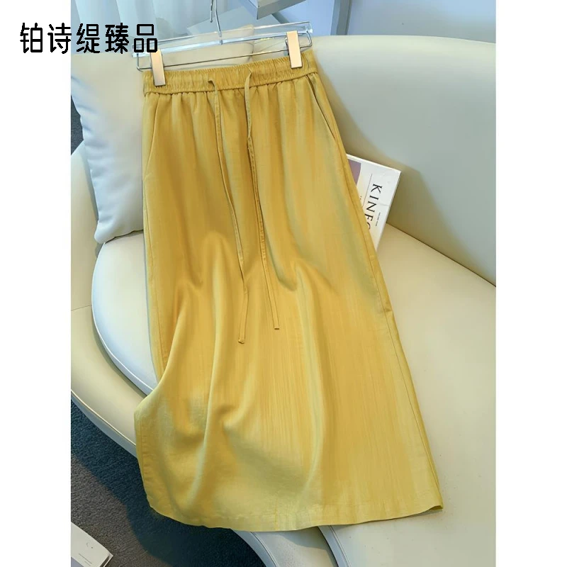 黄色亚麻半身裙女夏季薄款2025新款苎麻直筒裙棉麻包臀裙a字裙子