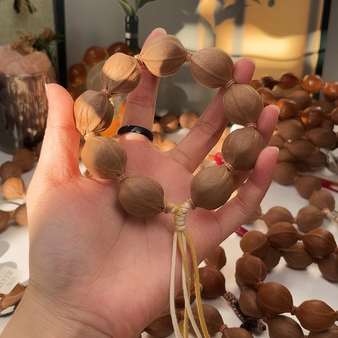 咖***泡橄榄核吊坠2126素串