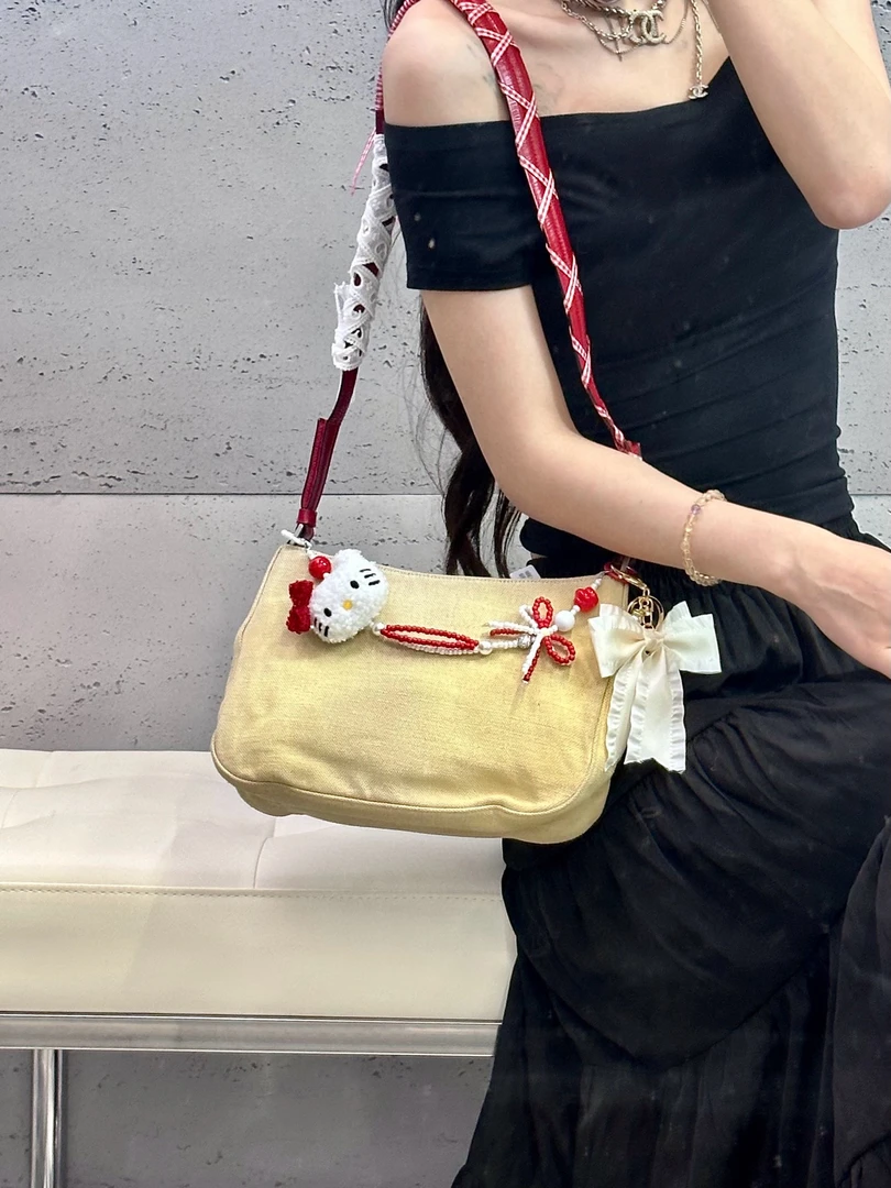 95新 Prada/普拉达 prada 米色帆布单肩包(K)